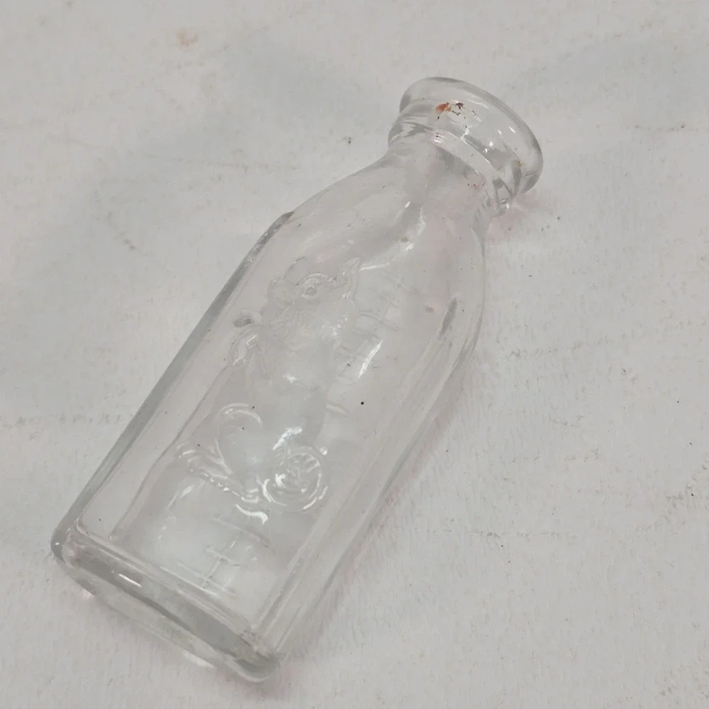Vintage Glass Baby Doll Bottle Embossed Dog Wetting toy